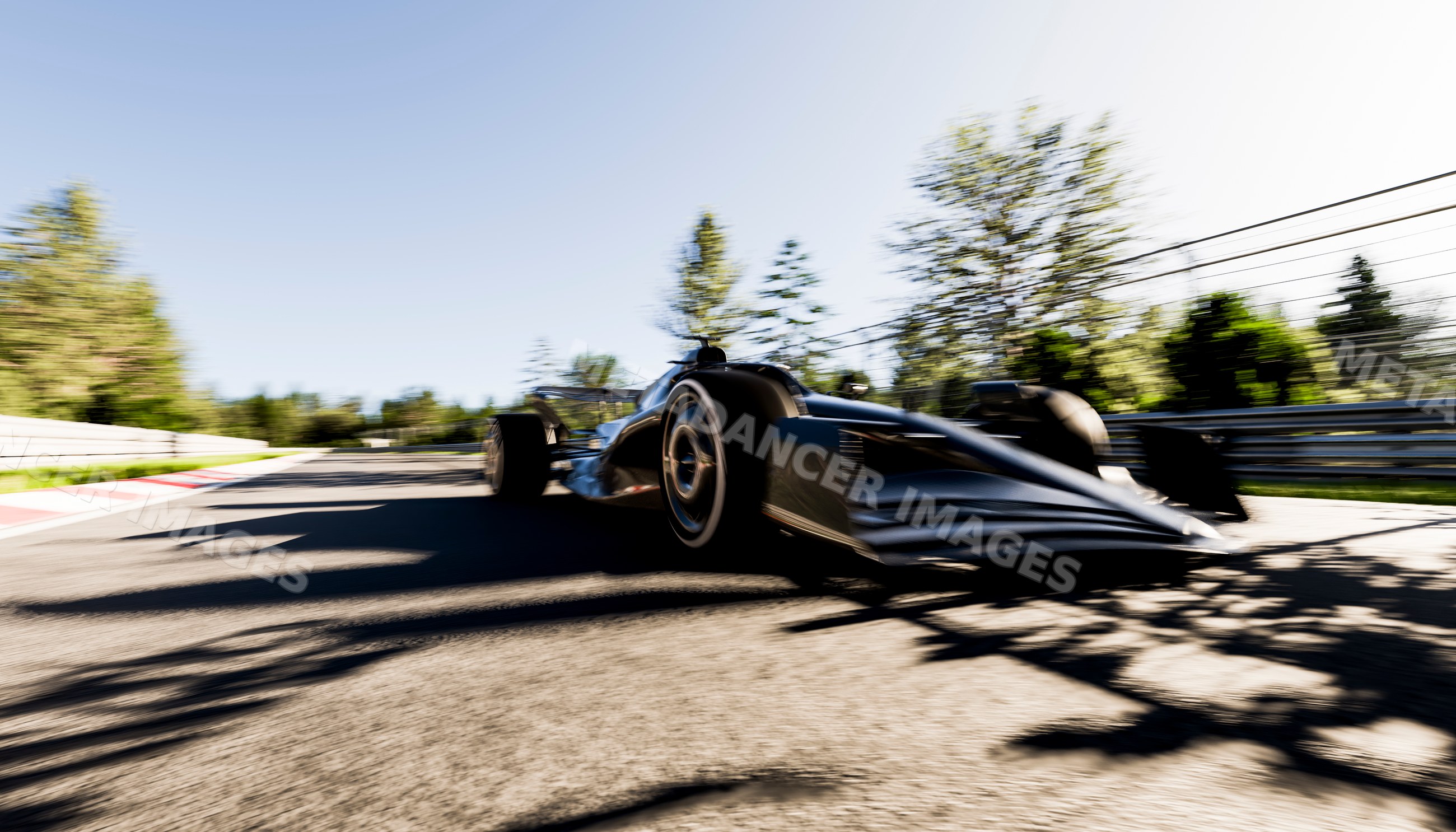 Racing car speeding on an outdoor race track in sunlight