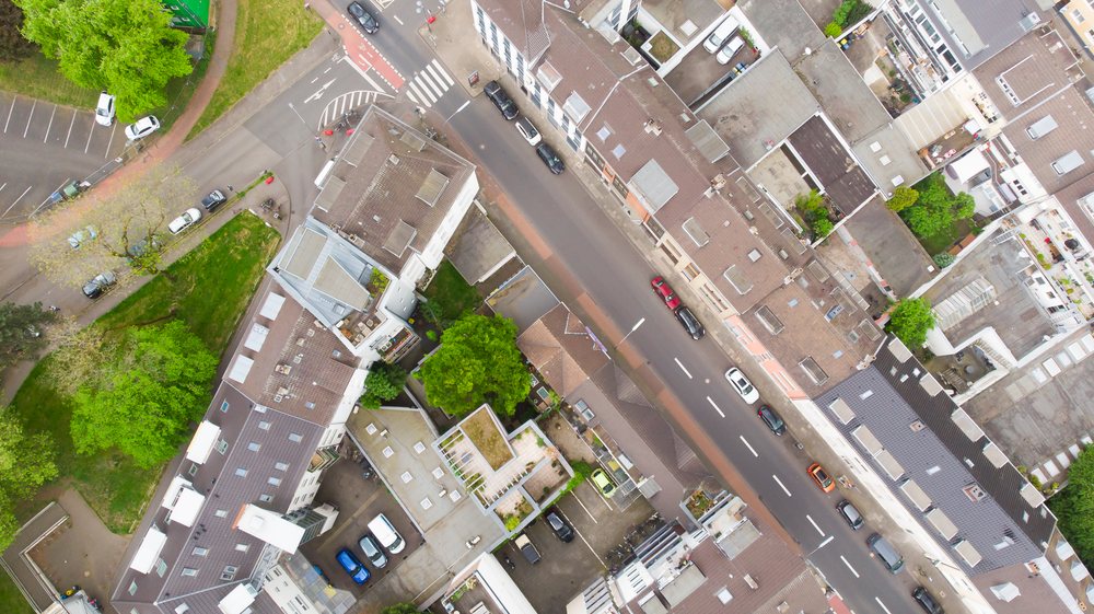 Aerial view of residential buildings and streets in a historic