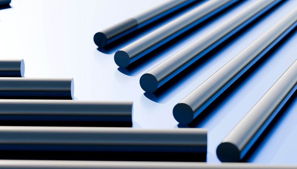 Metal rods arranged in parallel on reflective surface