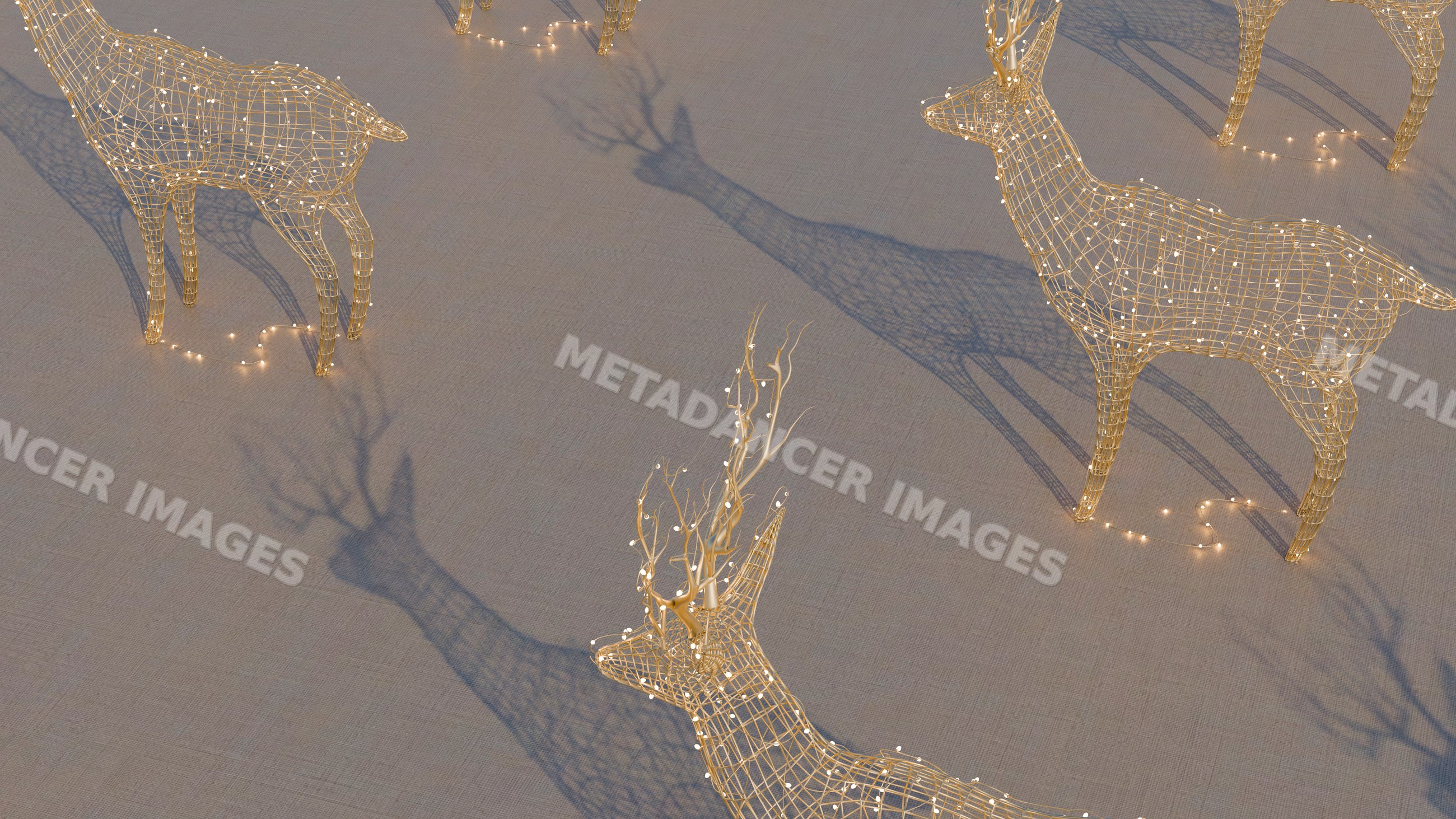 Decorative wireframe reindeer sculptures with holiday lights casting