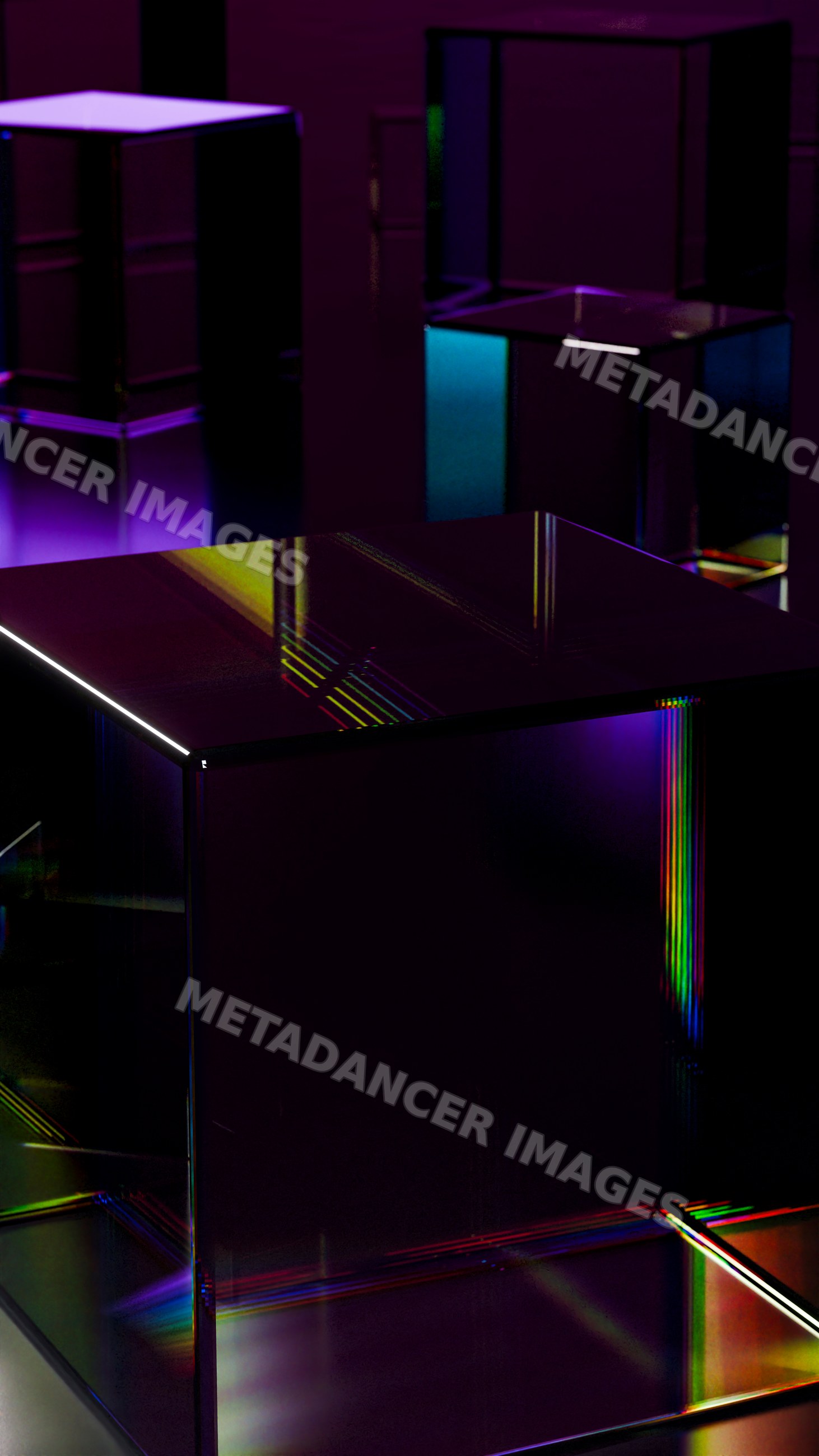 Glass cubes with colorful light reflections on dark surface
