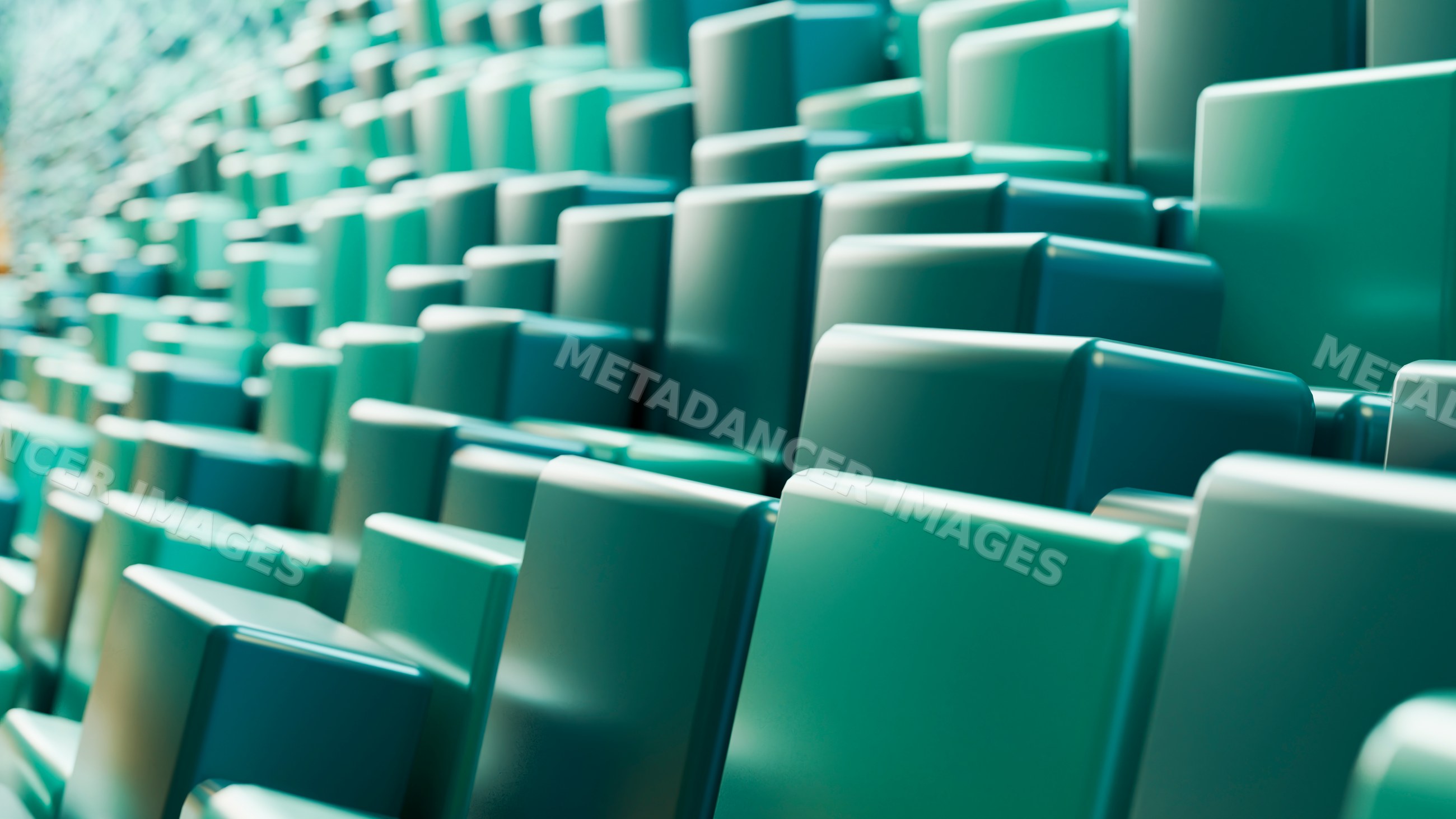 Empty green stadium seats arranged in rows at a large venue