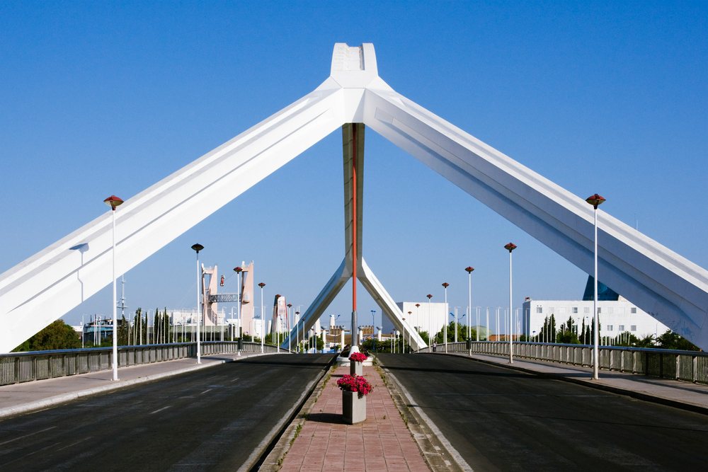Puente del cachorro bridge with flower pots and street lamps Spain