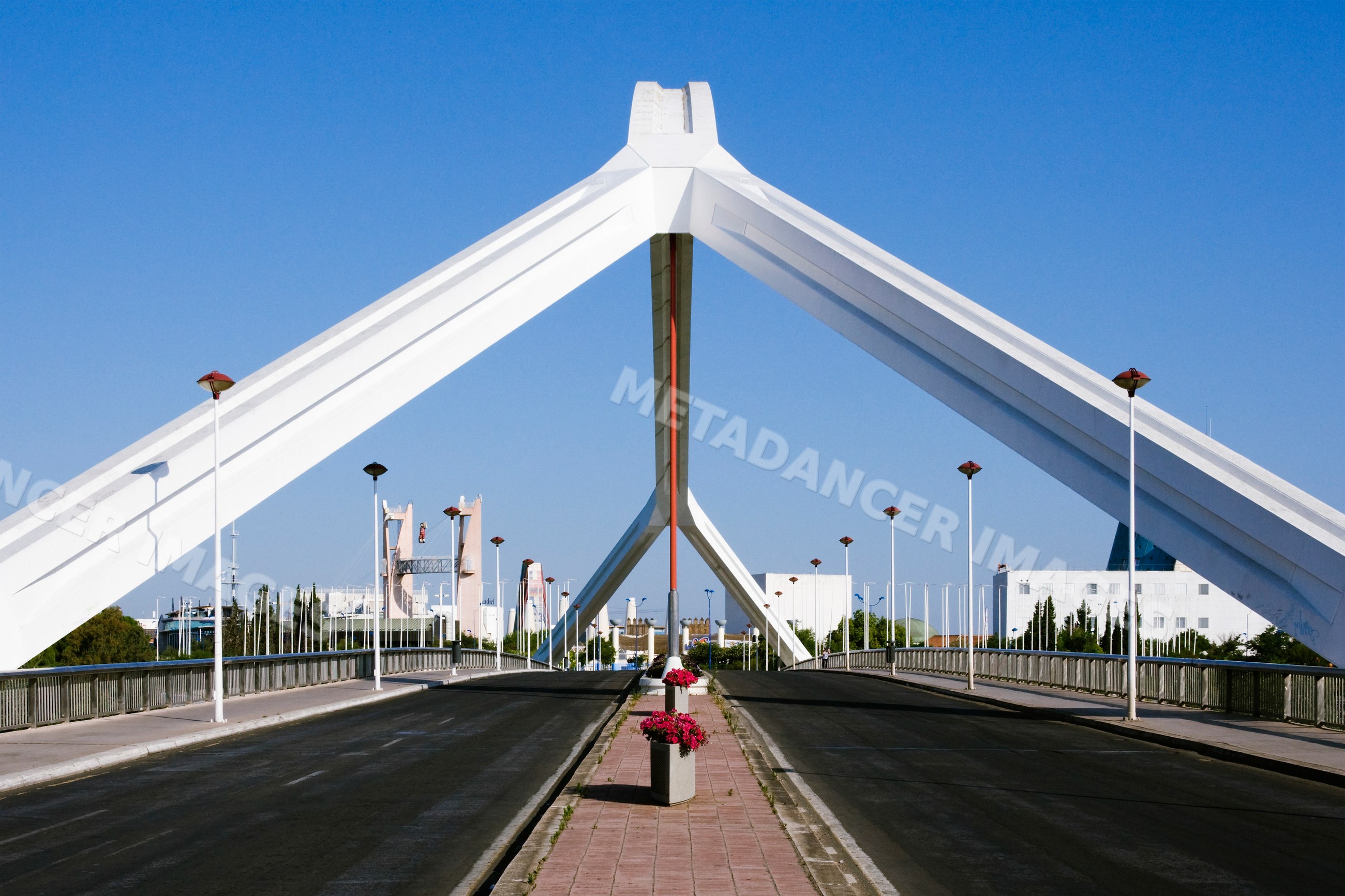Puente del cachorro bridge with flower pots and street lamps Spain