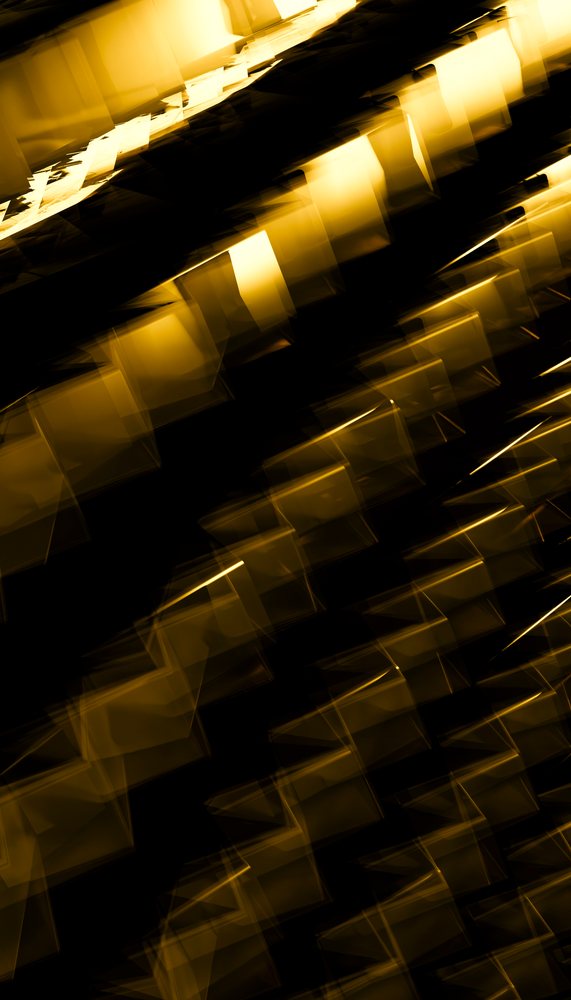 Abstract yellow light shapes with motion blur on dark background