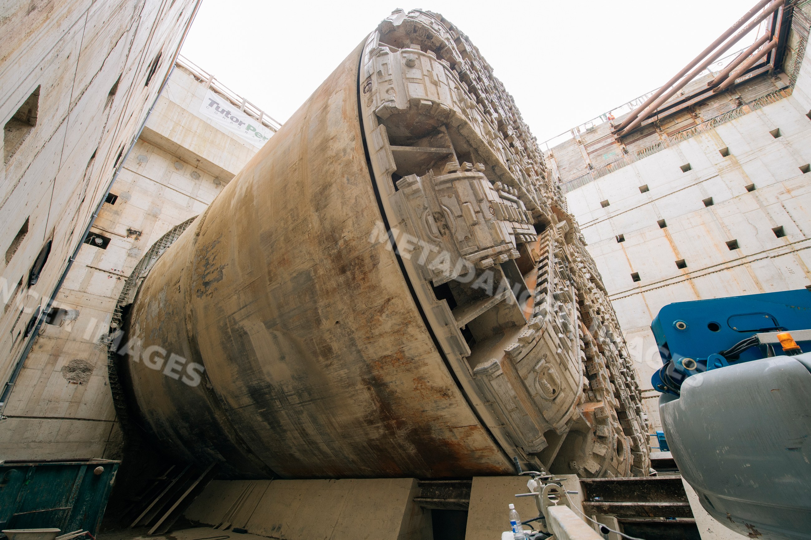 Tunnel boring machine positioned inside a construction site