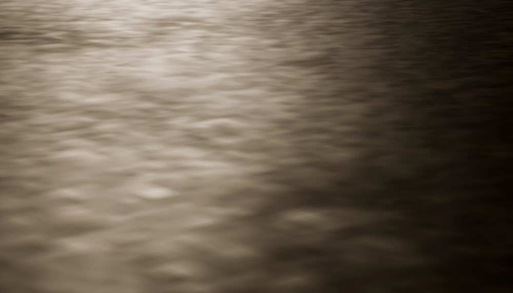 Rippling water surface with natural texture and reflections