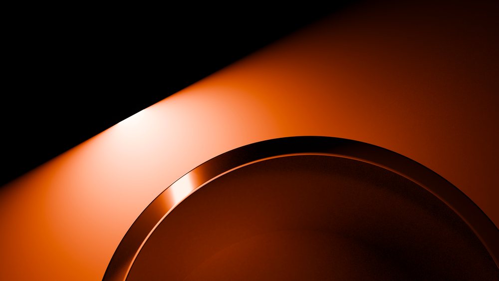 Empty round ceramic plate on brown table surface with warm lighting