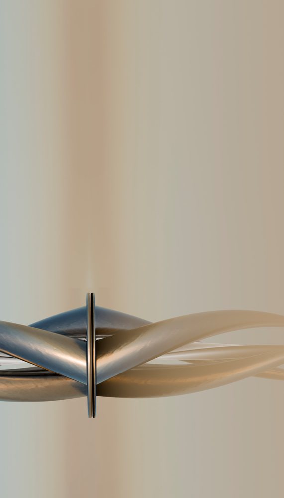 Close-up of a twisted metal ring sculpture with smooth curves