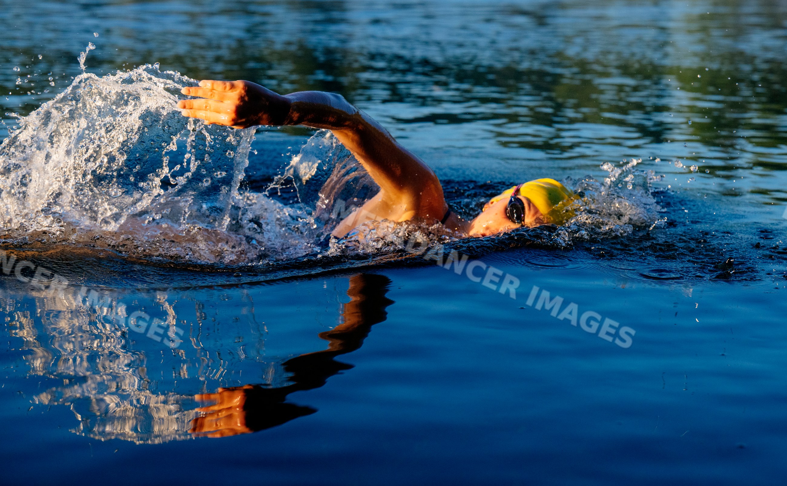 White swimmer performing freestyle stroke