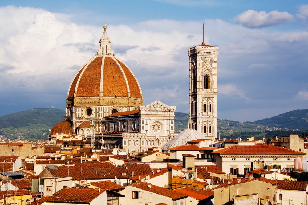 Florence cathedral with iconic dome overlooking city rooftops