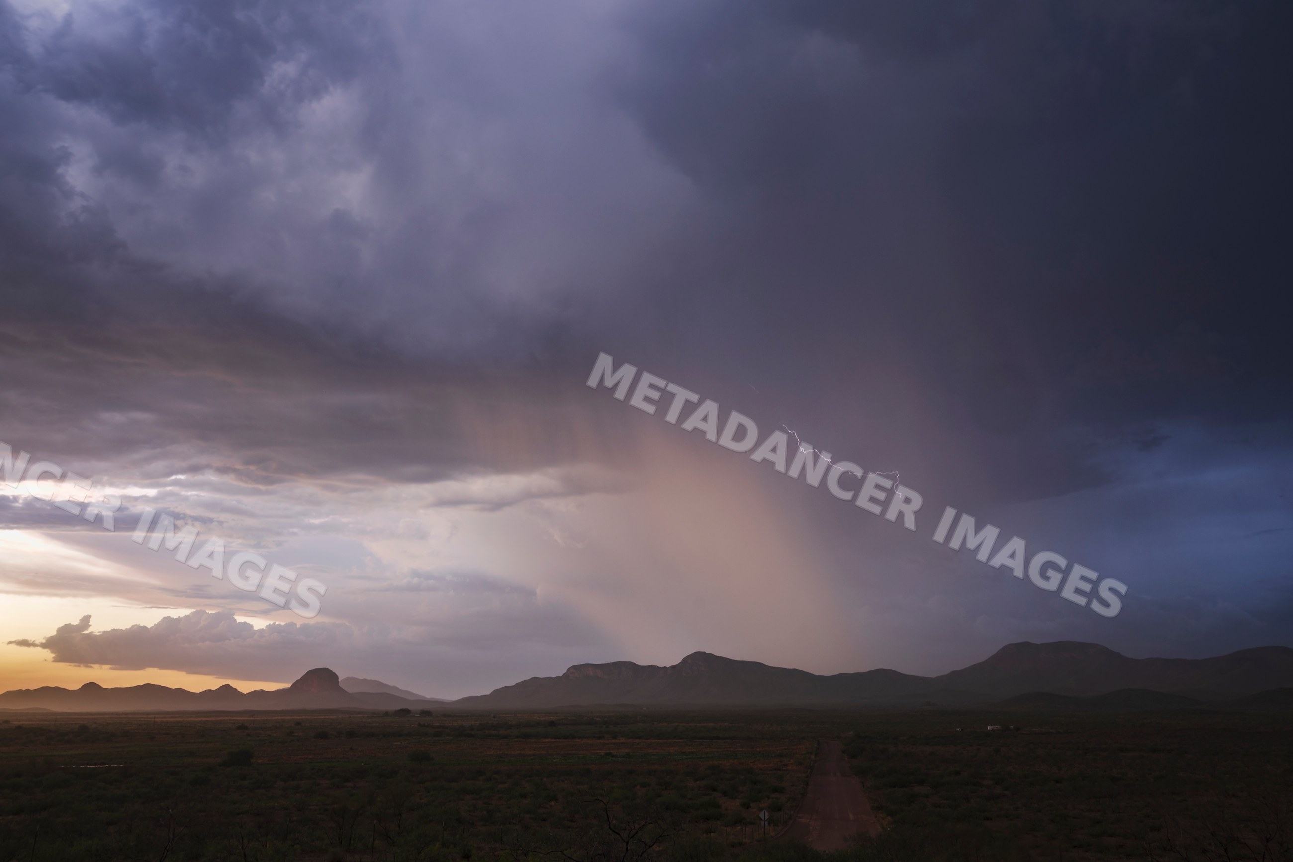 Rain shaft and lightning over the chiricahua mountains