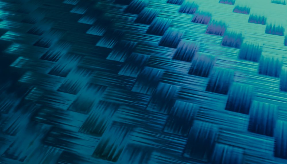 Close-up of a blue woven pattern creating an abstract textured surface