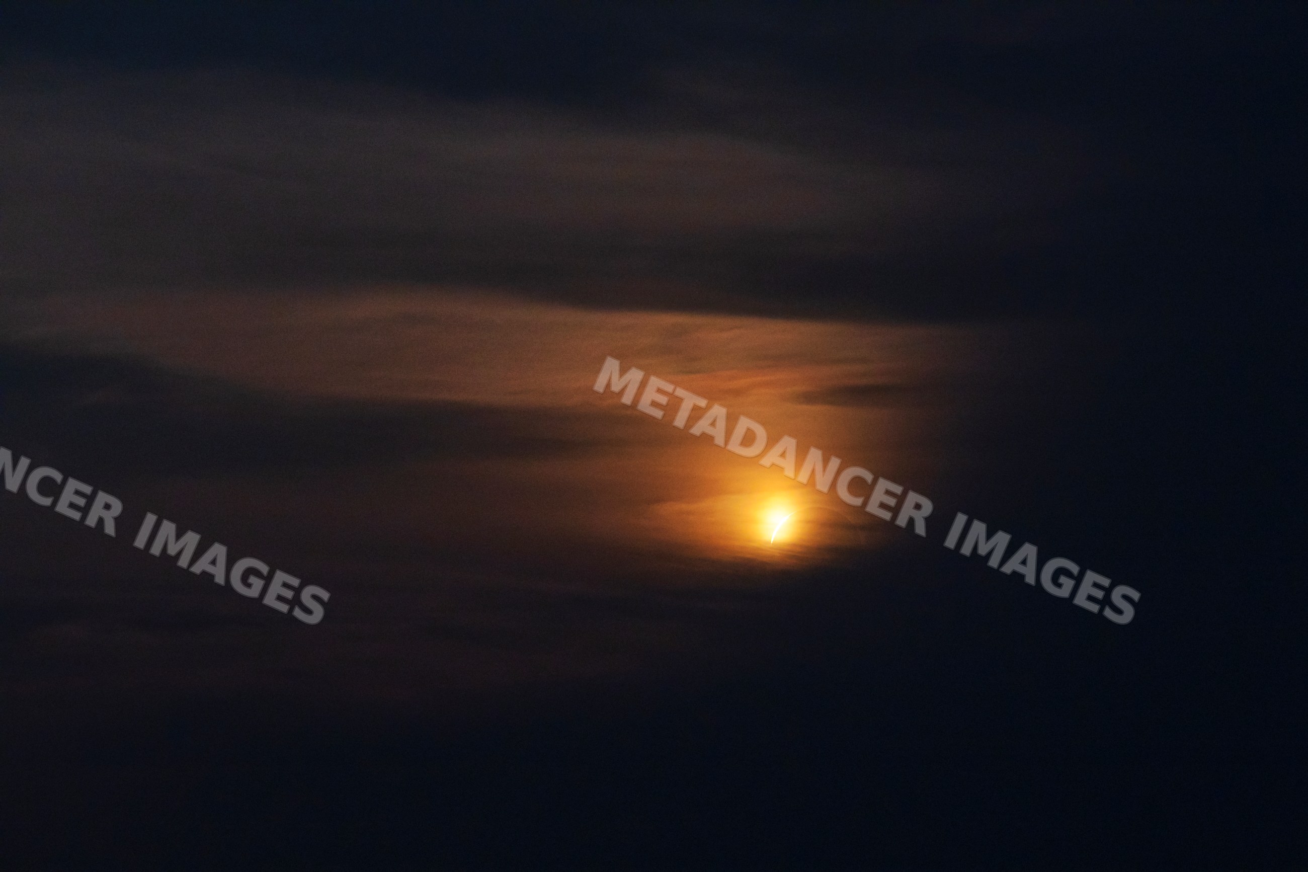 Diamond ring phase of the solar eclipse over Mallorca sky