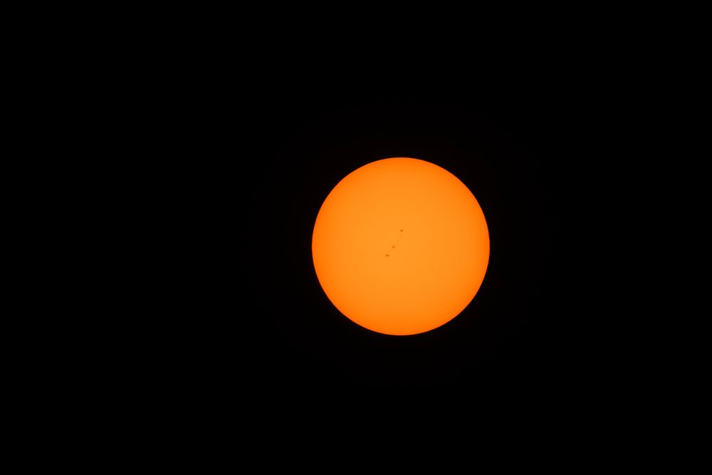 Sun with visible sunspots during eclipse in Los Angeles, USA