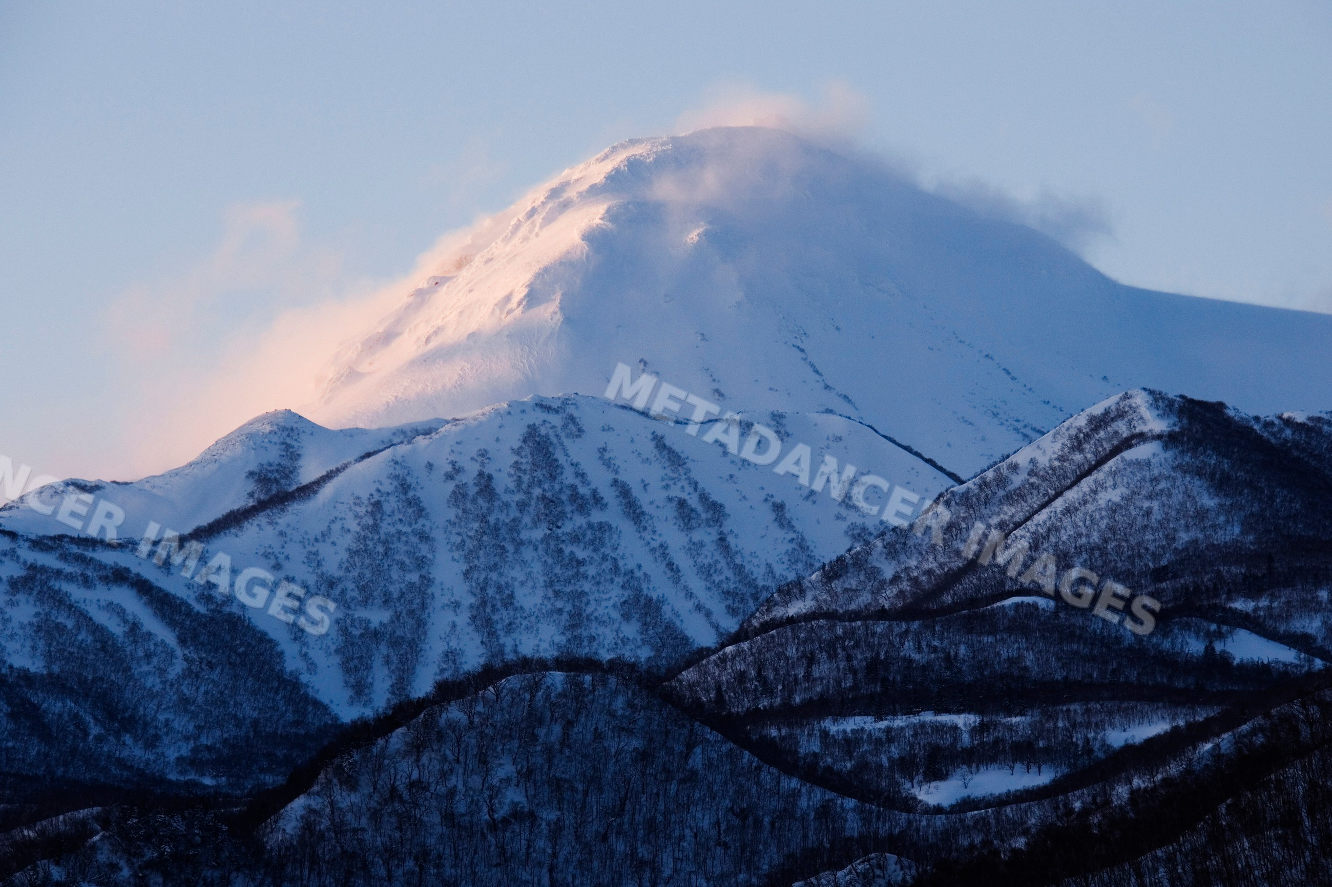 Mount rausu snow-covered peak in shiretoko national park, hokkaido