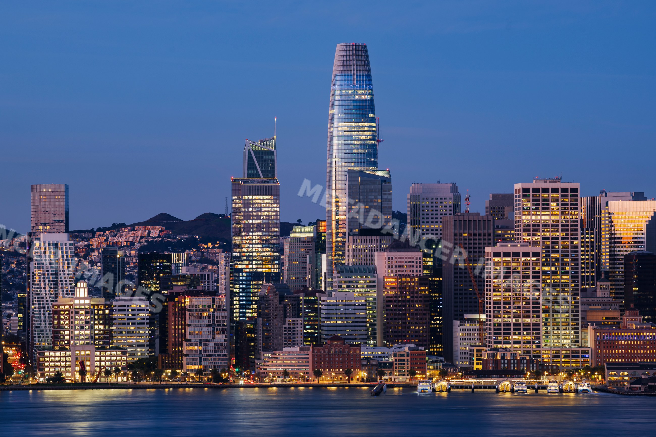 San Francisco skyline at Dawn with waterfront and illuminated