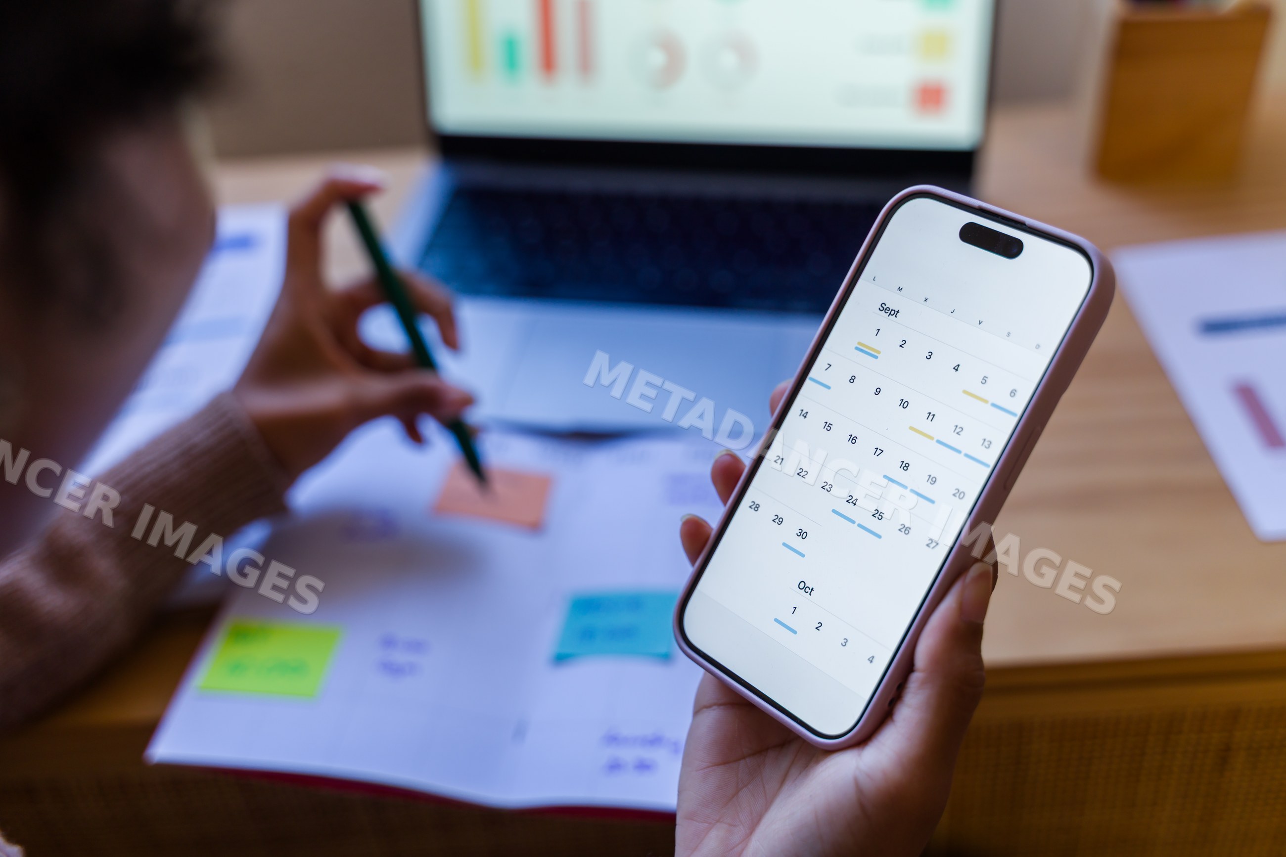 Smartphone calendar app displaying monthly schedule for planning work