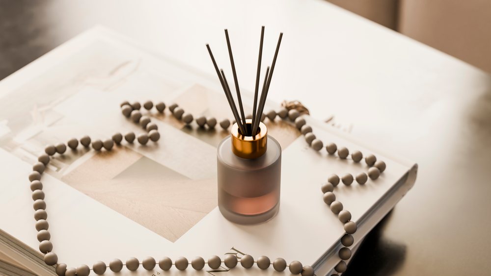 Frosted glass aromatherapy diffuser with reed sticks and decorative