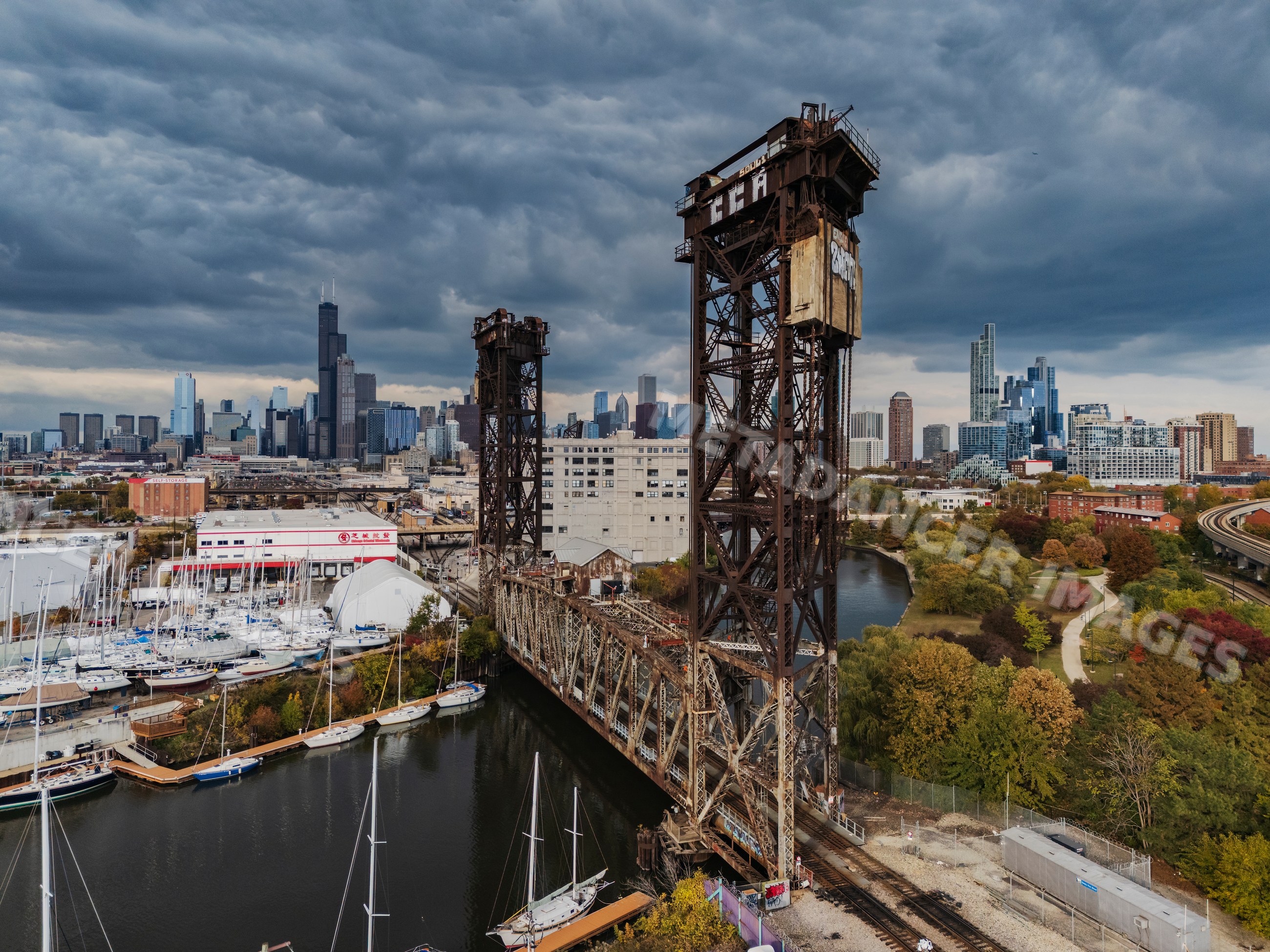 Canal Street Railway Bridge with chicago skyline and autumn foliage
