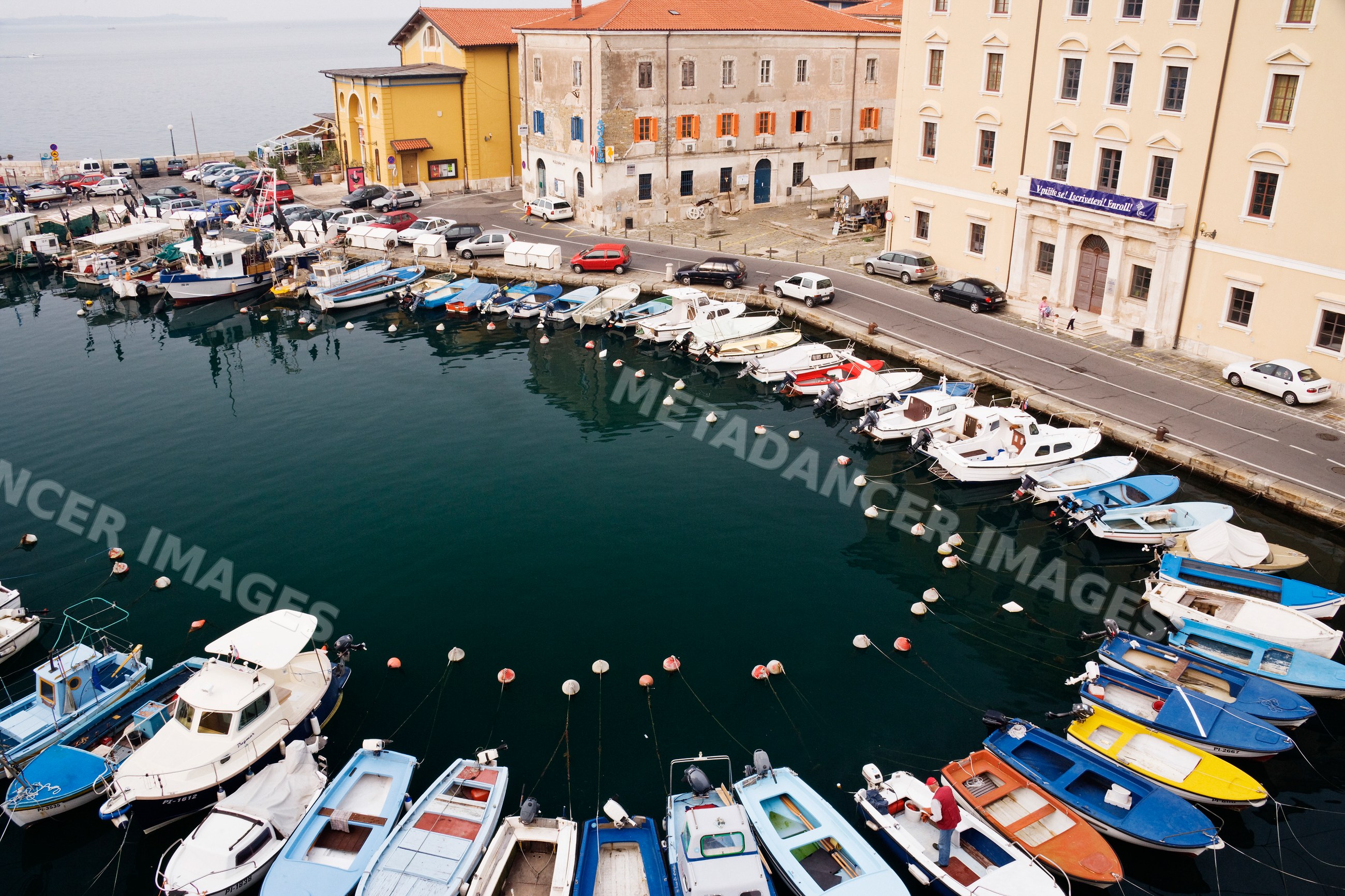 Boats moored along waterfront dock slovenia