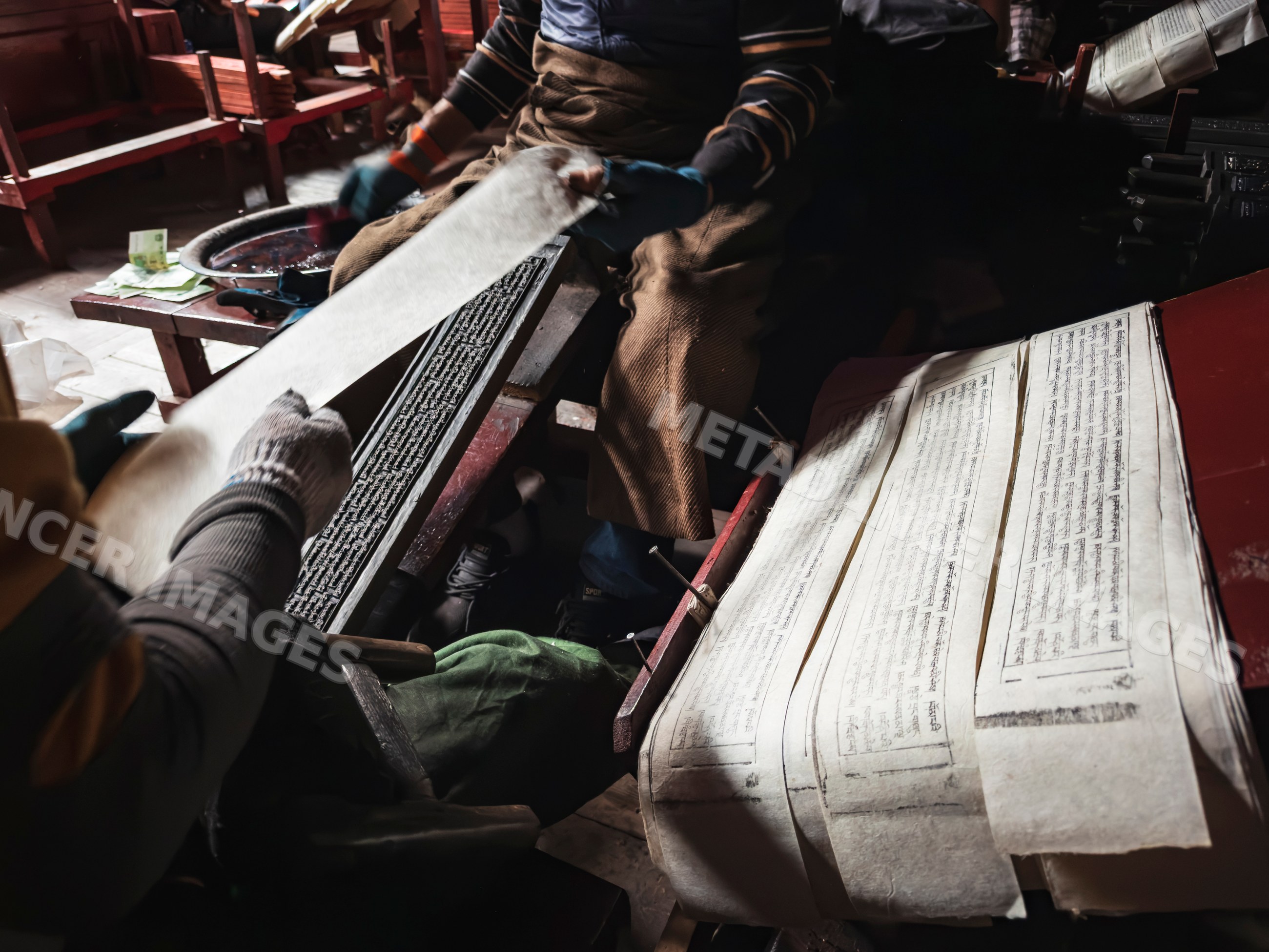 Craftsmen printing Tibetan Scripts