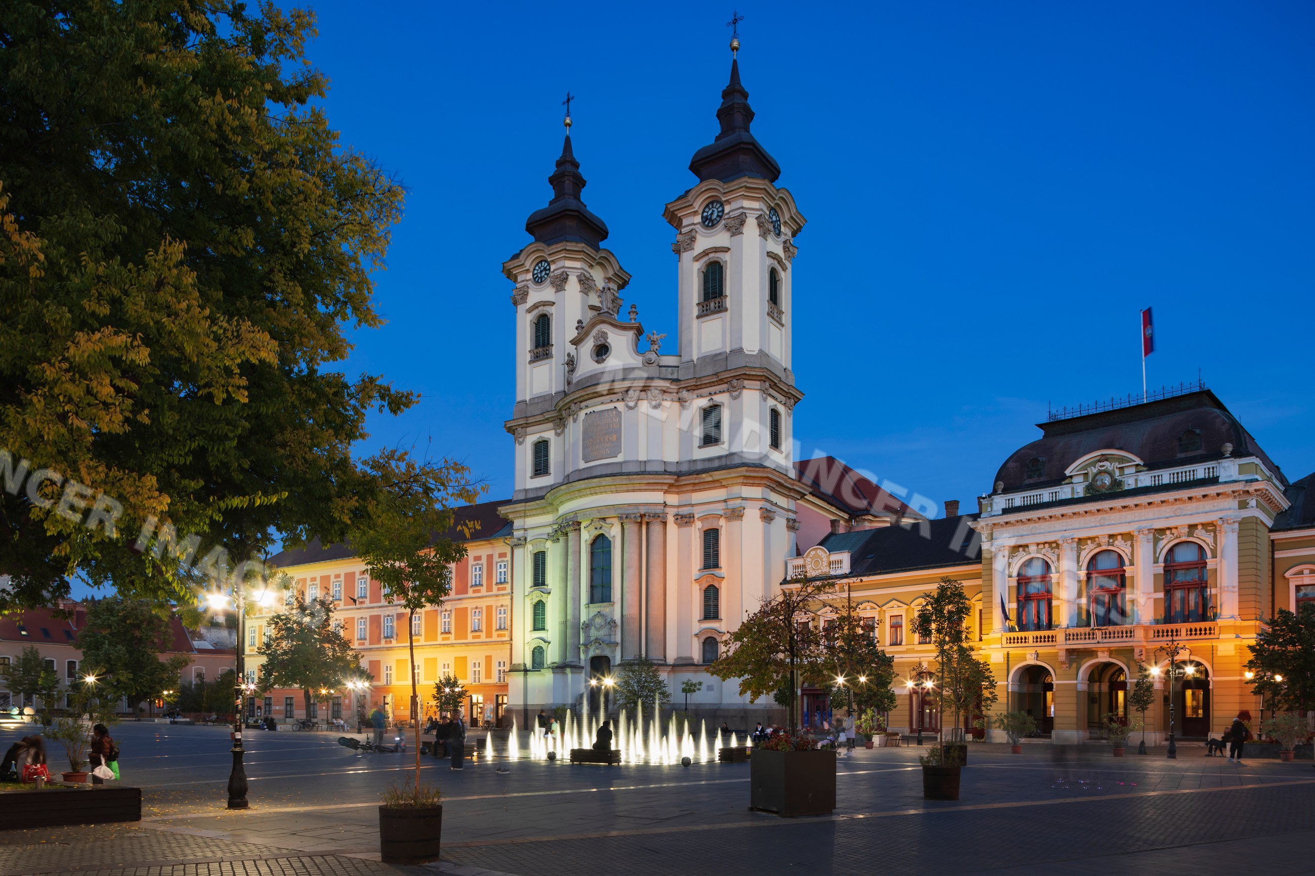 Minorite Church at Dobó Square in eger, Hungary at evening