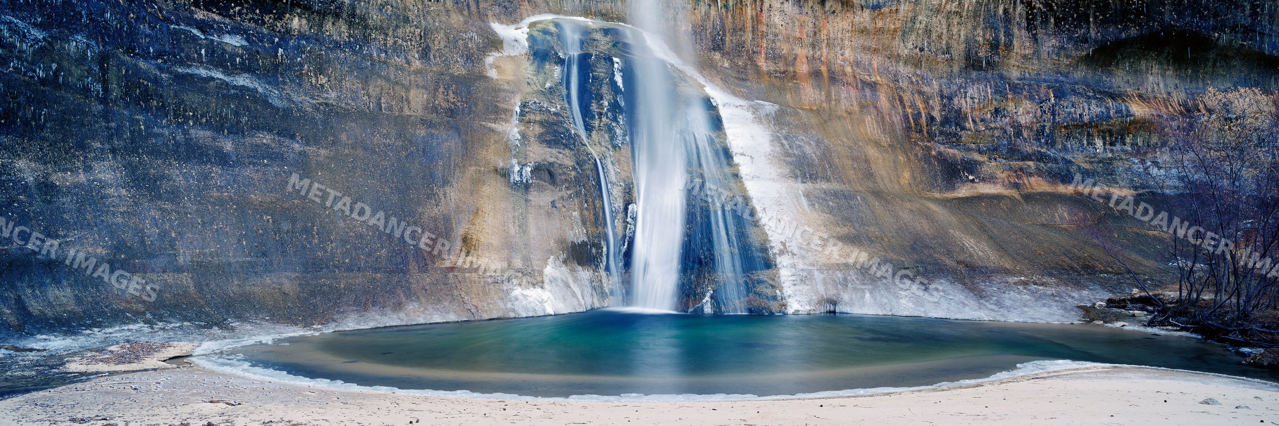Lower calf creek falls waterfall pool in utah USA