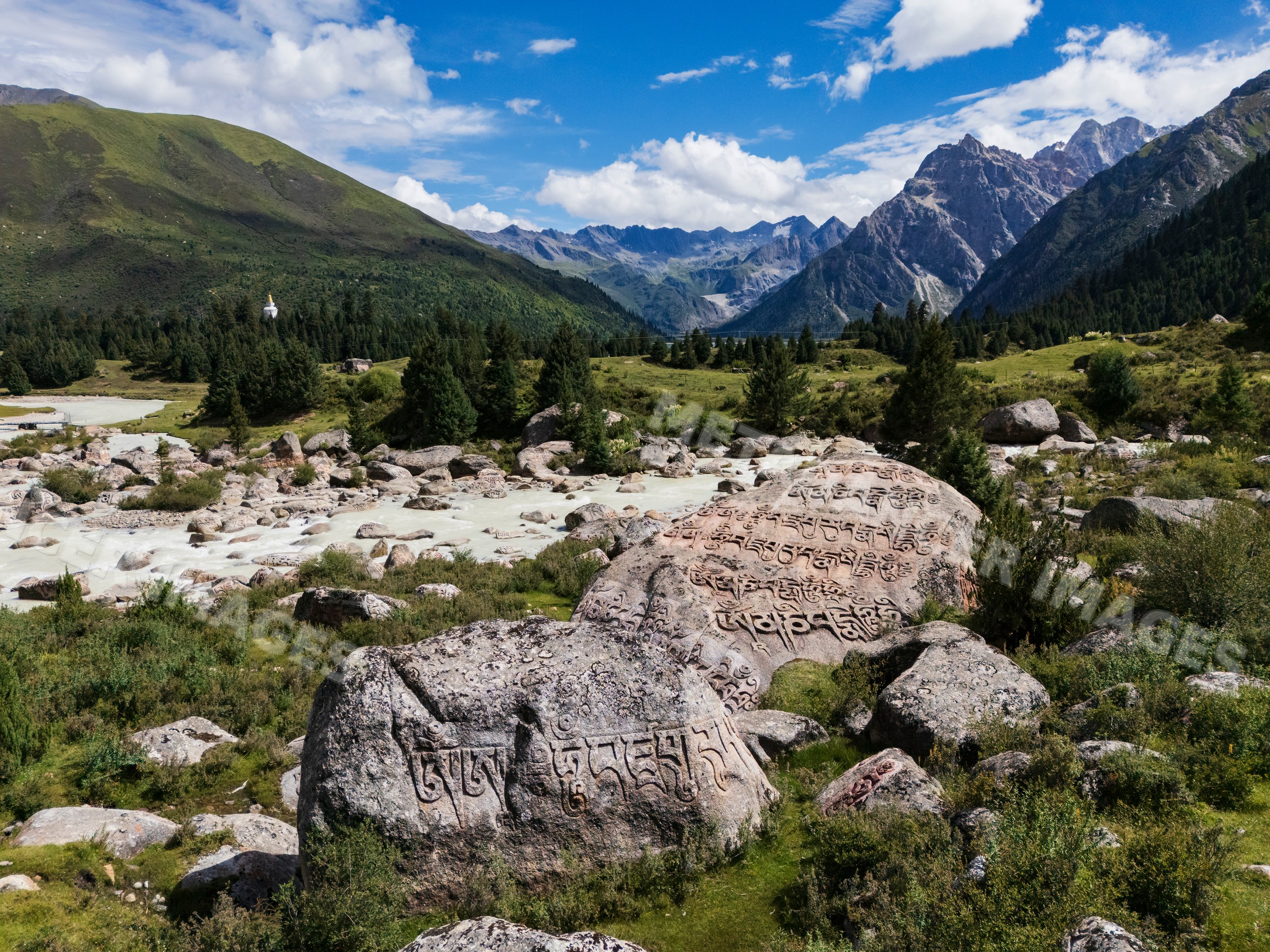 Rock carvings in mountainous valley