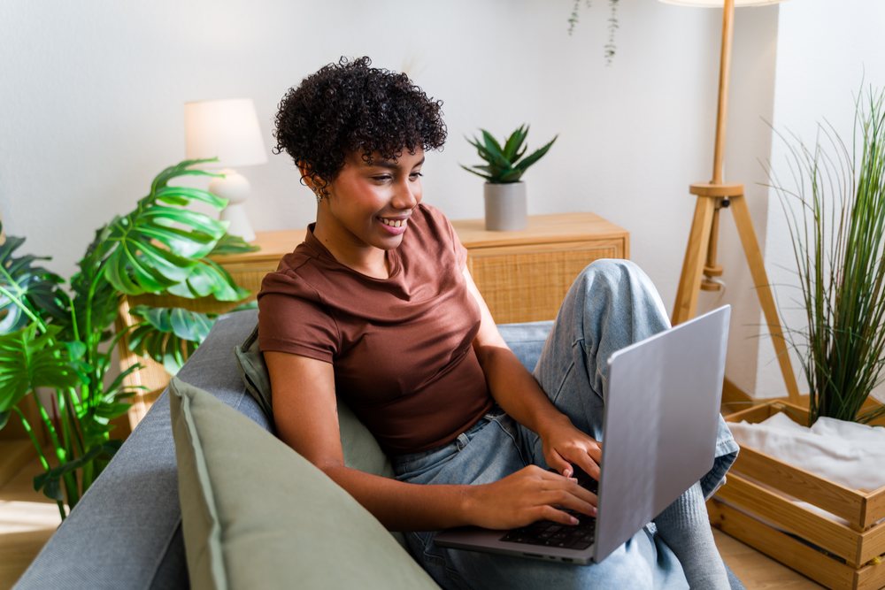 African American woman working on laptop