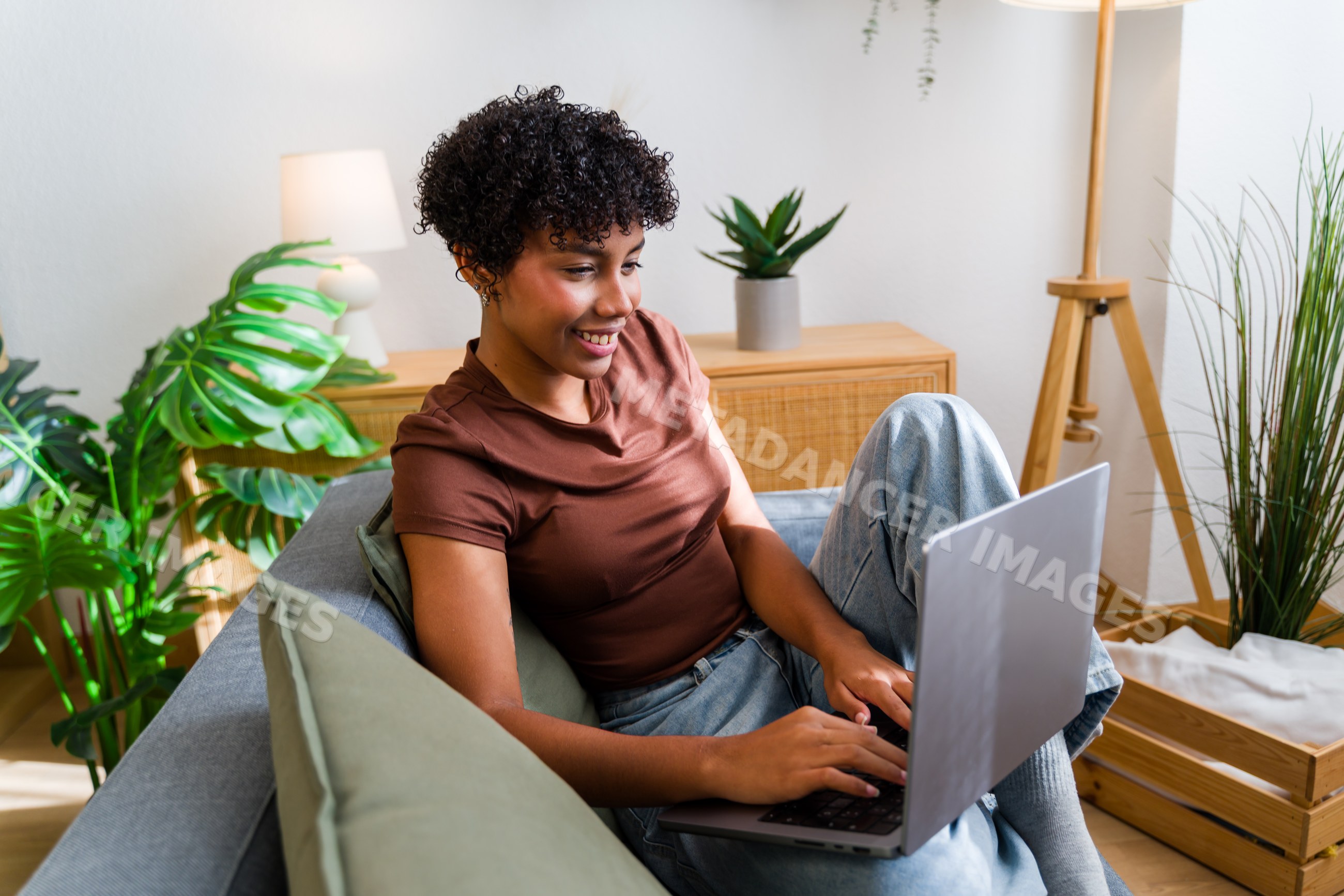 African American woman working on laptop
