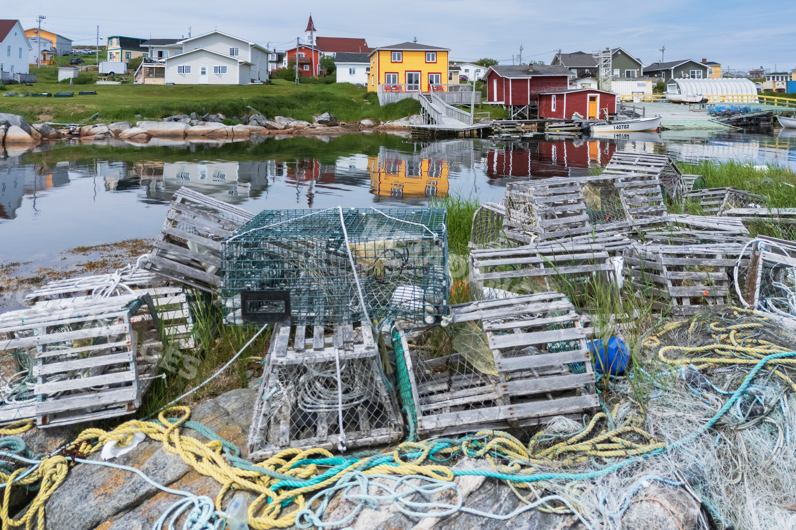 Fishing harbour with lobster traps and boats in greenspond