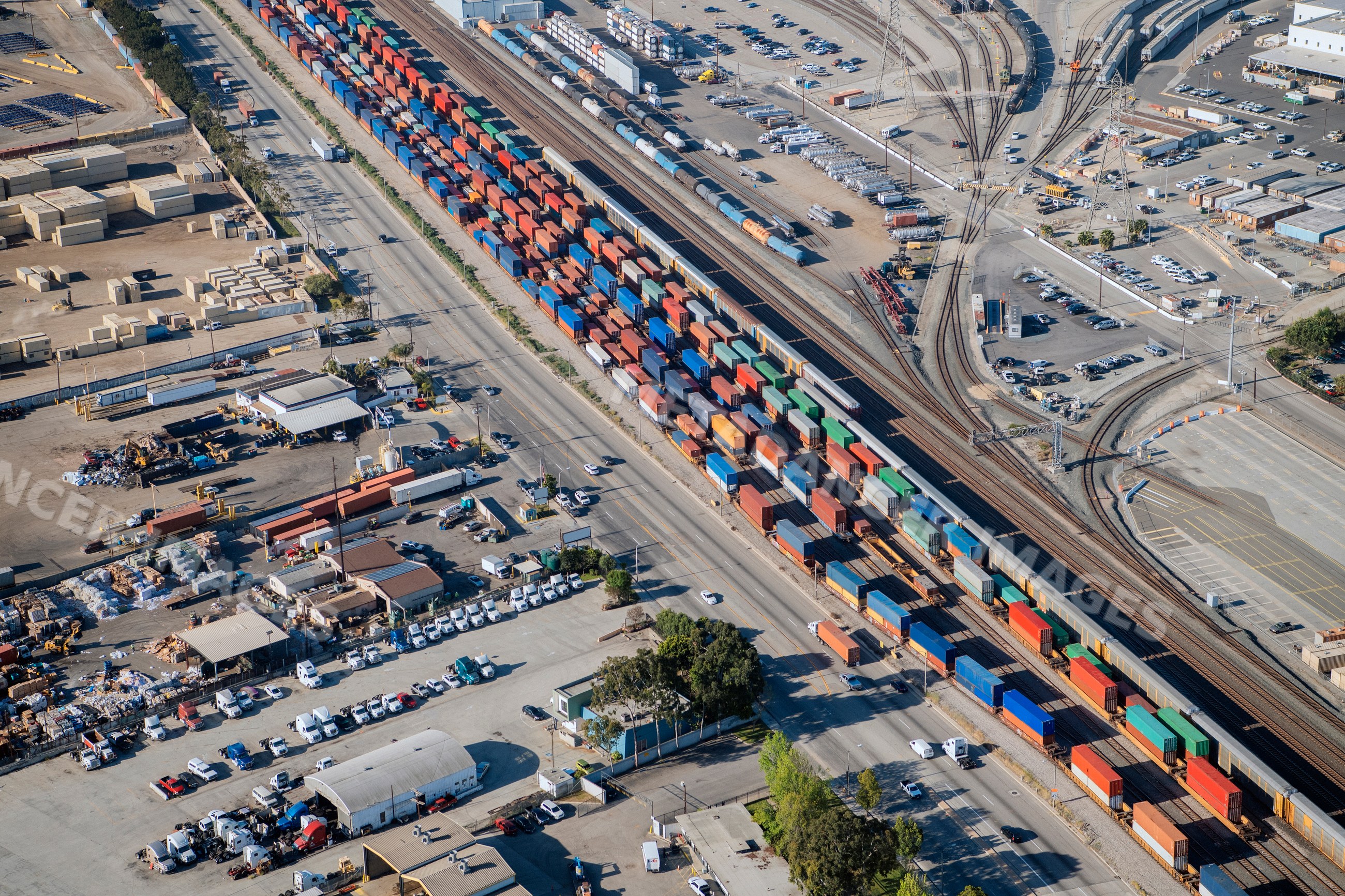Freight train with shipping containers at a major california port
