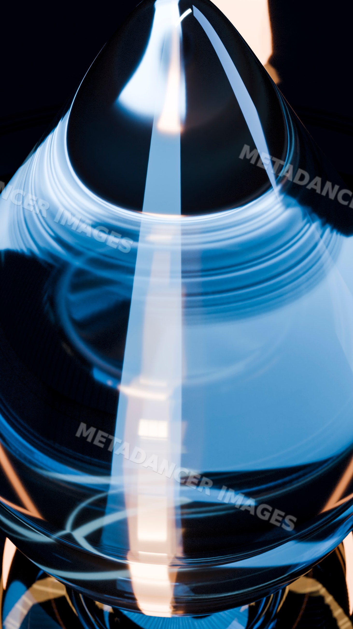 Close-up of reflective glass cone with blue light reflections