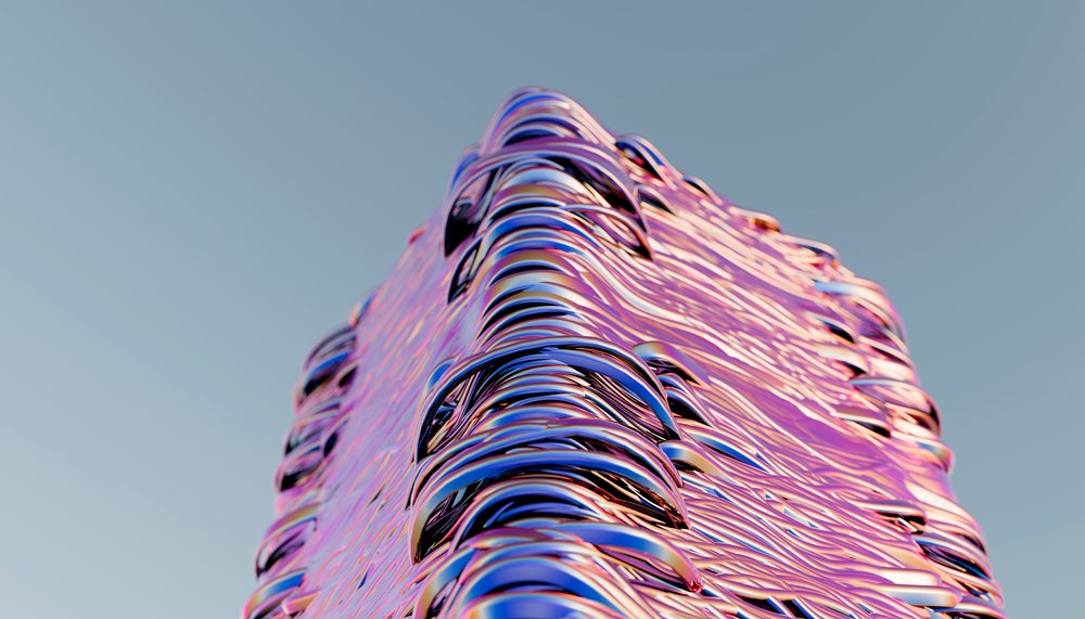 Abstract modern sculpture with shiny metallic wavy surface