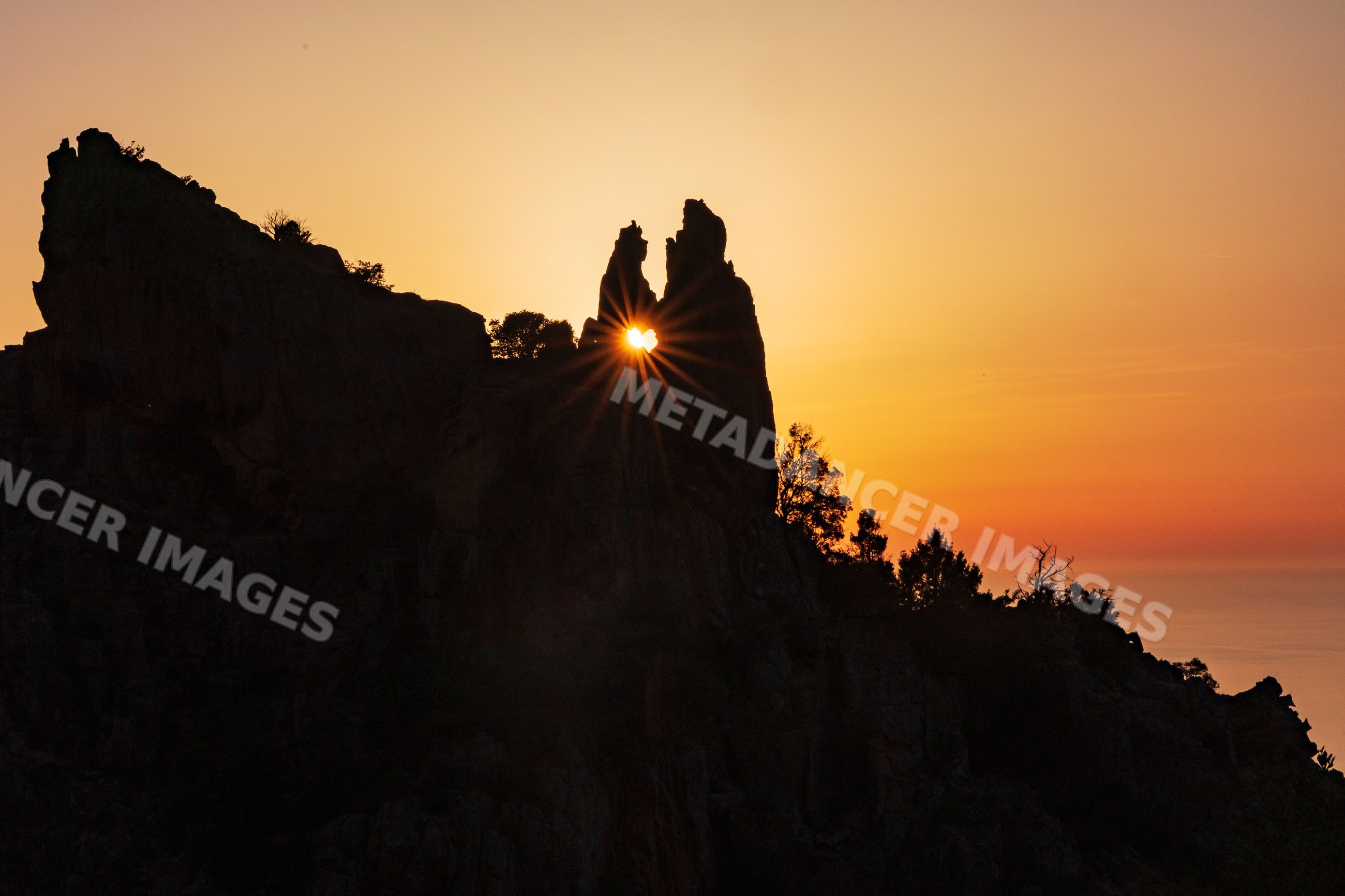Heart rock formation at Sunset in piana, corsica, france