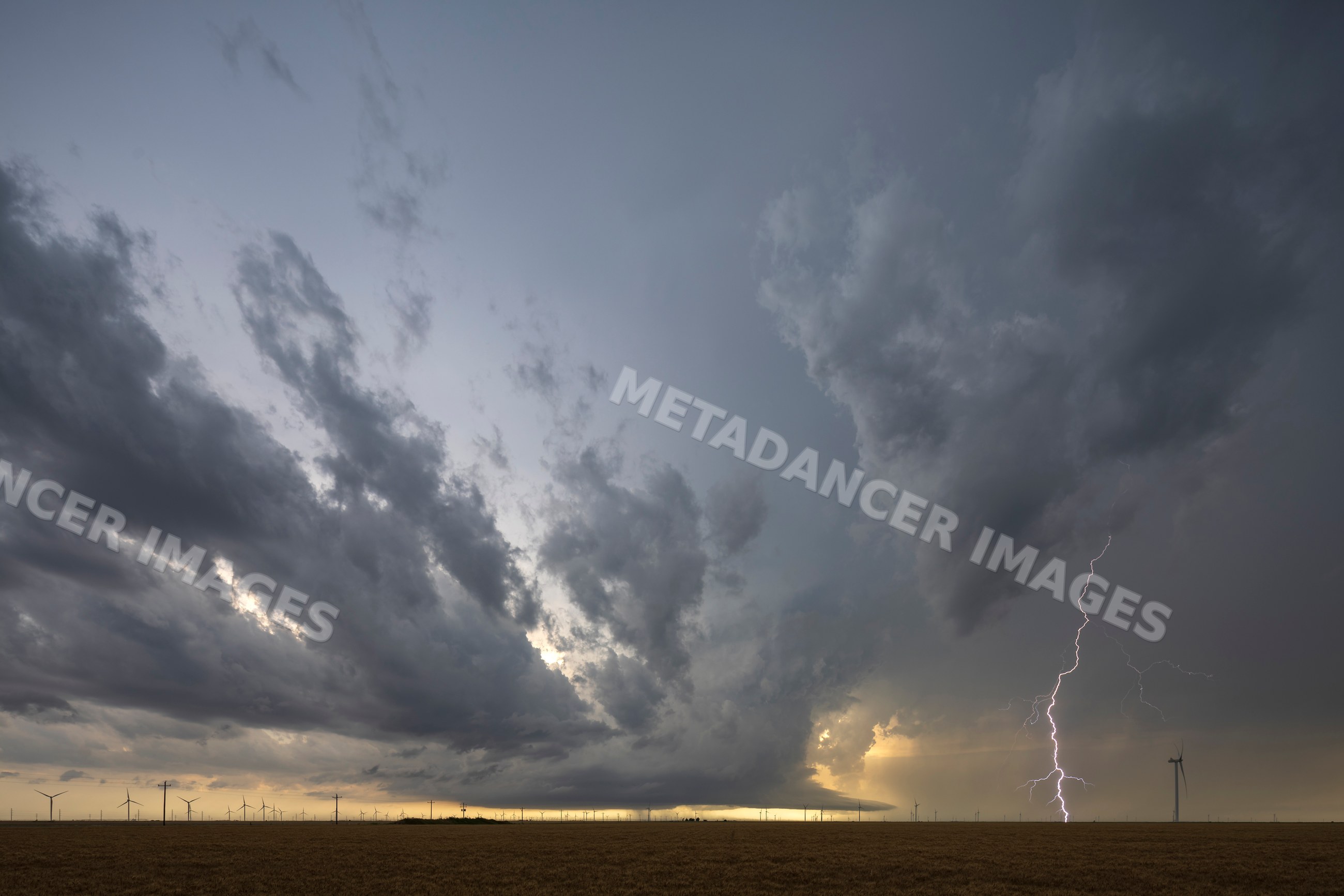 Lightning from a Supercell stalled against an Outflow Boundary