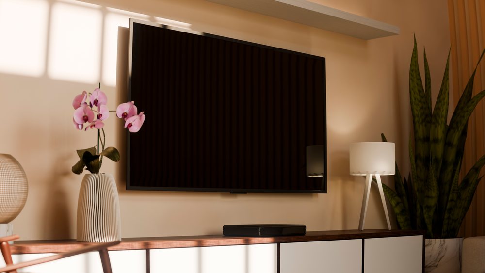 Modern living room with wall-mounted flat screen tv and indoor plants