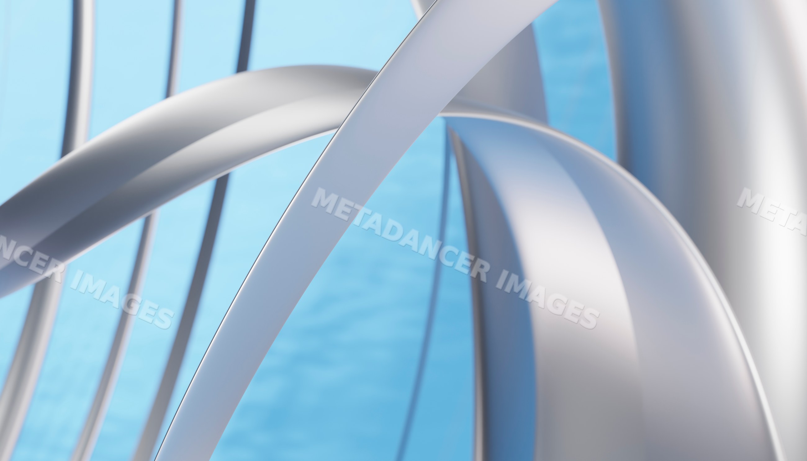 Abstract silver loops forming a modern artistic sculpture