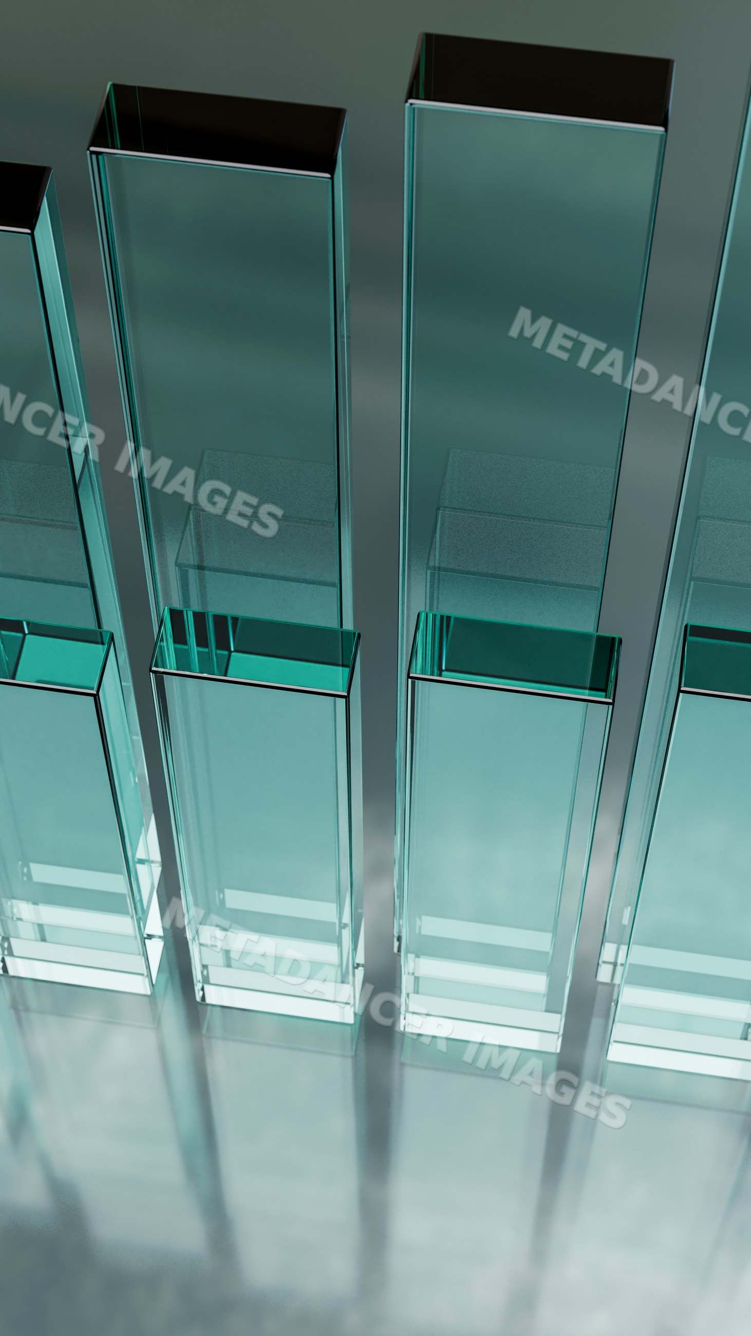 Transparent glass pillars on reflective surface in modern design