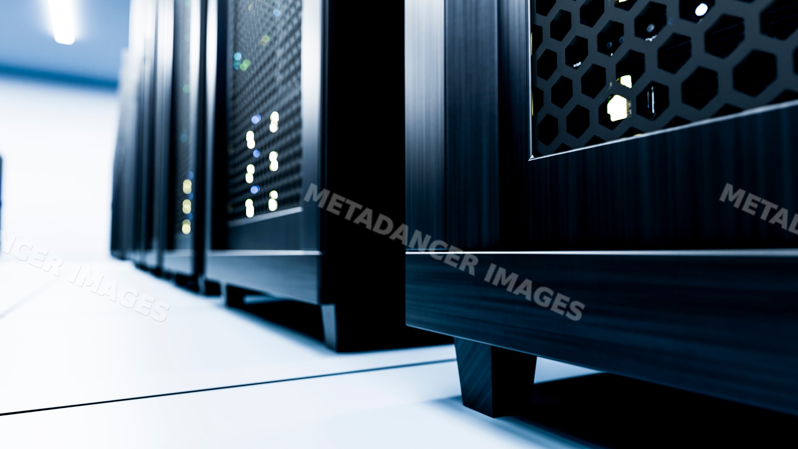 Server racks with ventilated black panels in data center