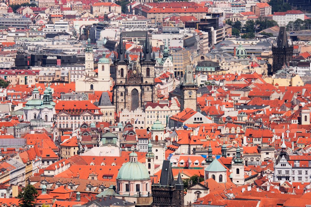 Old town red roofs and church towers cityscape