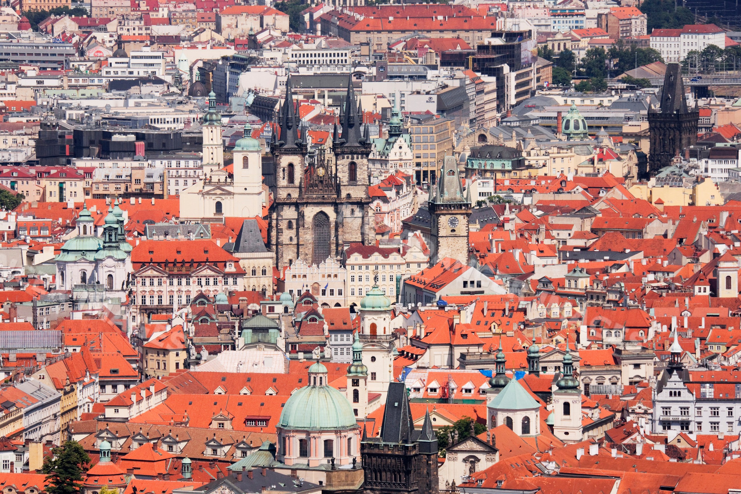 Old town red roofs and church towers cityscape