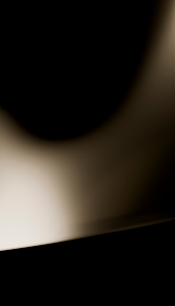 Abstract curved shadow pattern with soft dark and light gradients
