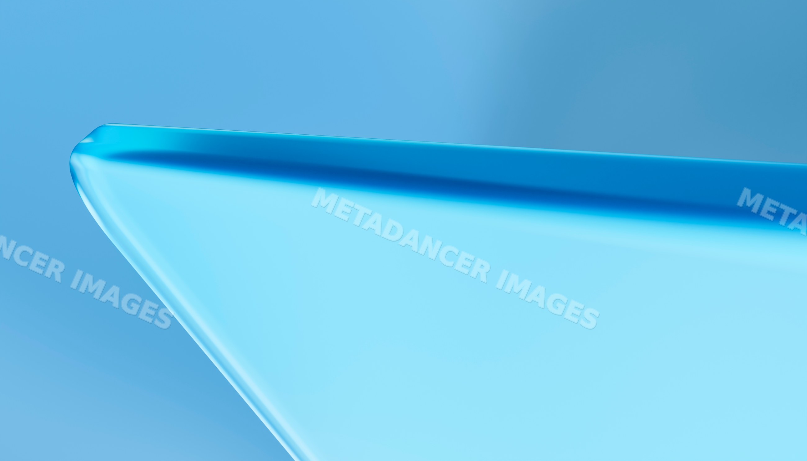 Close-up of blue glass corner with smooth rounded edges