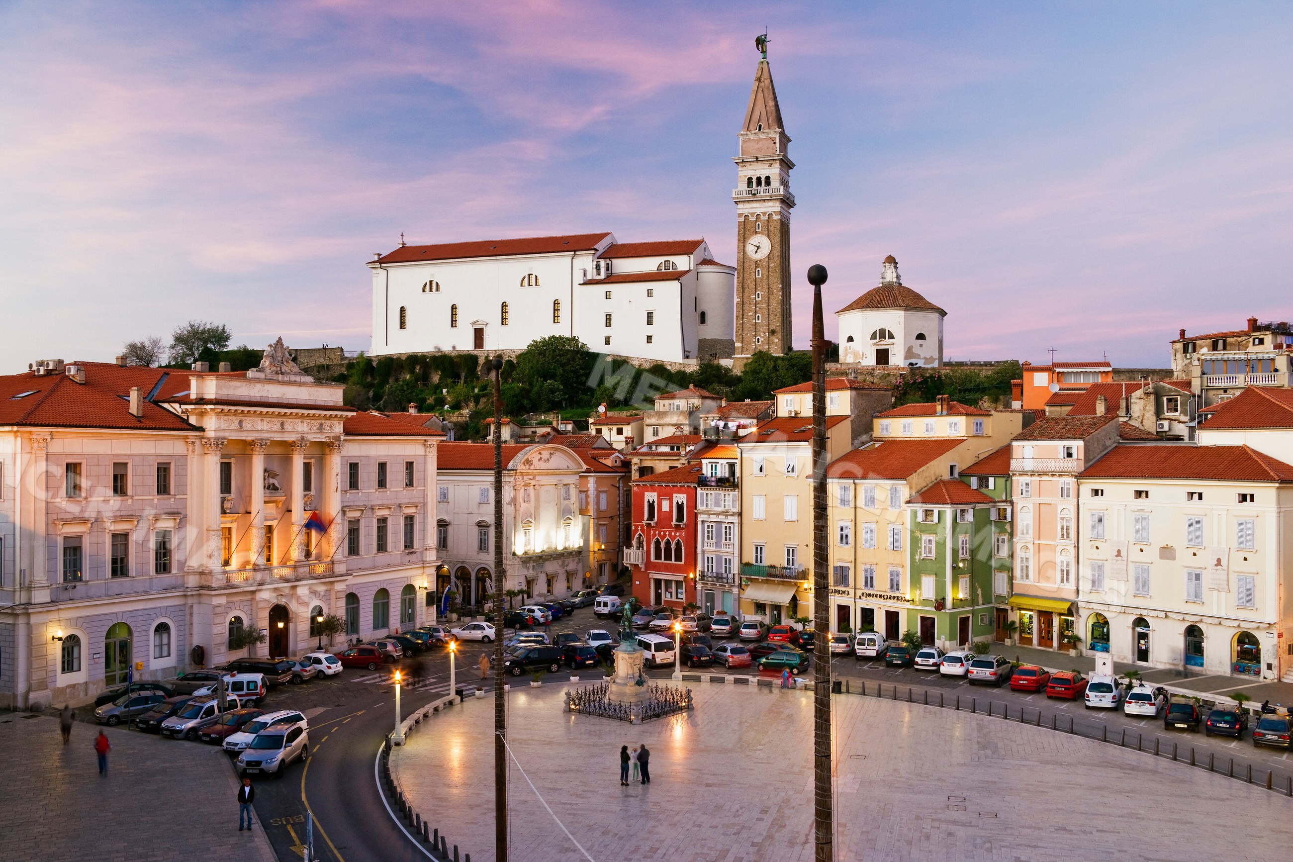 Tartini square with bell tower and historic buildings, slovenia
