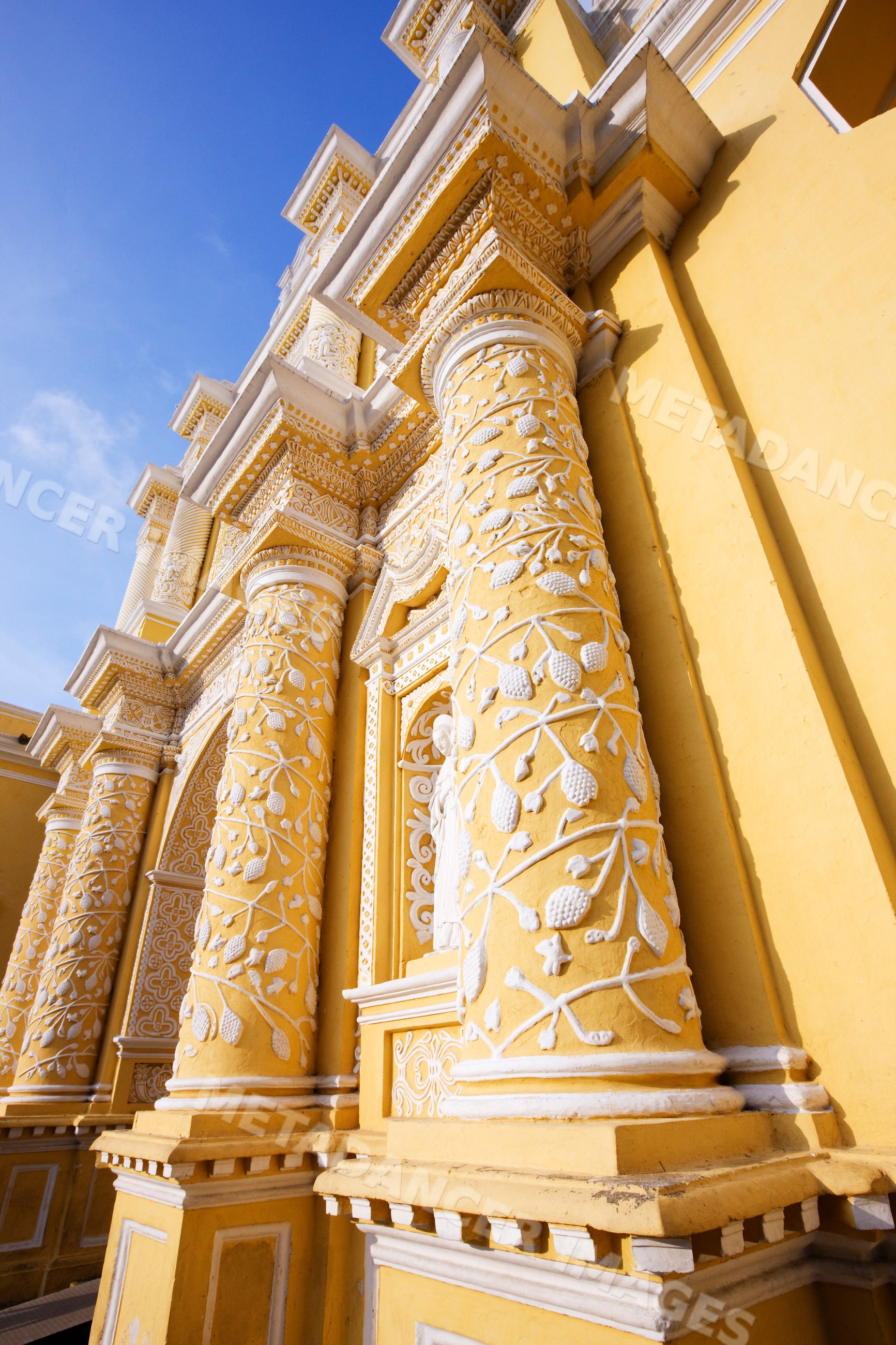 Iglesia la merced ornate yellow baroque church columns guatemala