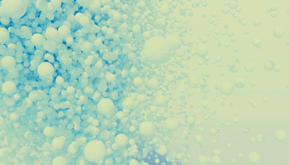 Clusters of light blue 3d spheres float