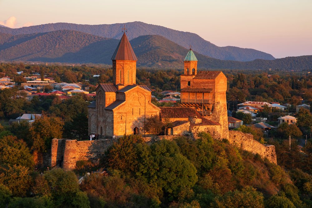 Town of Sighnaghi with the Caucasus Mountains in a church