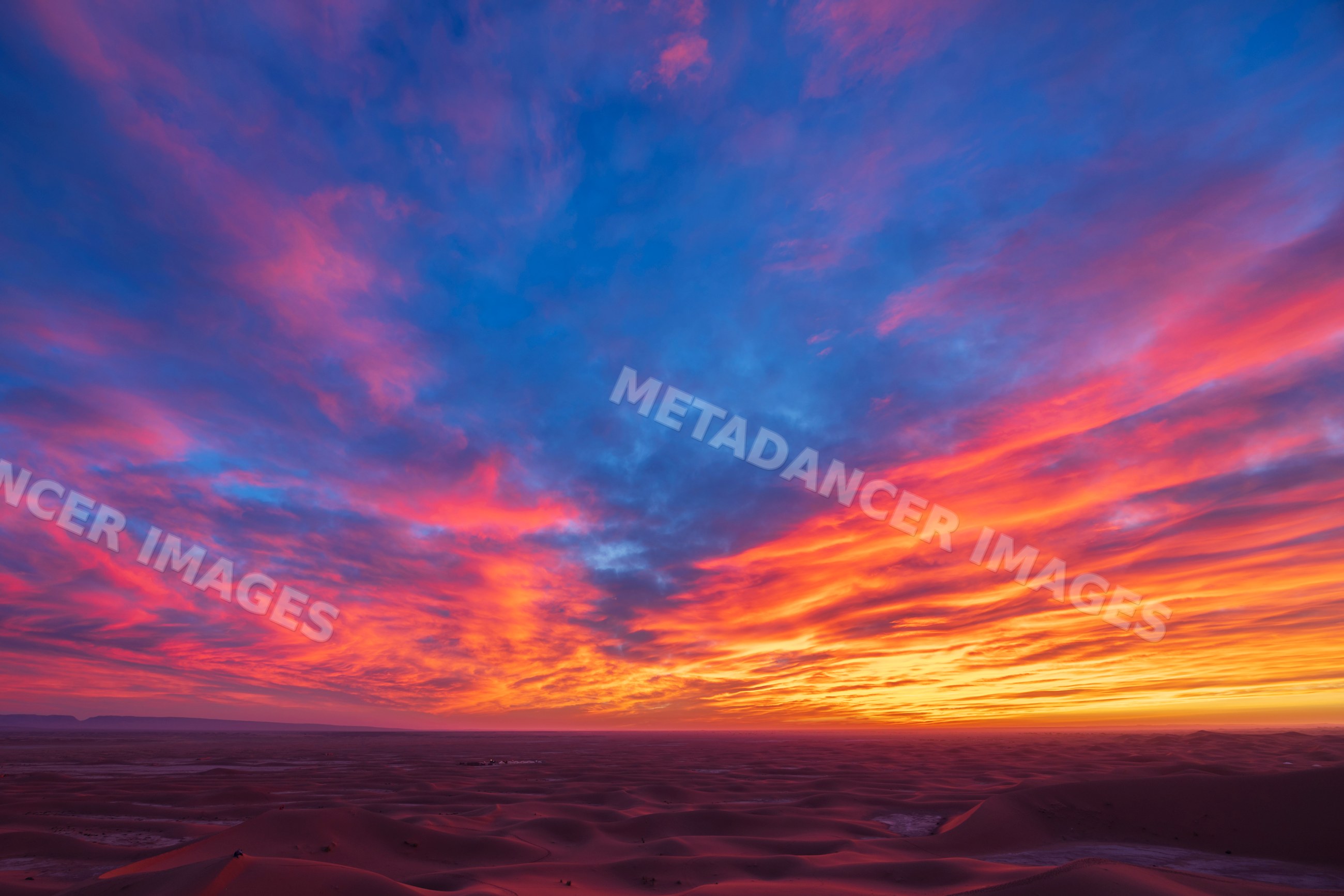 Sunrise over chaggaga sand dunes desert